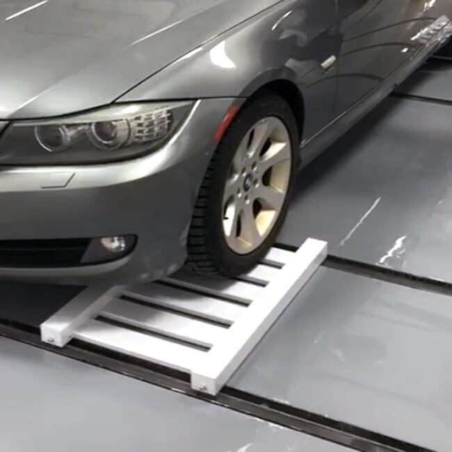 Car Dolly and track system. Sturdy lightweight design. Easy handling of cars.