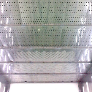 Washing booth. Air intake from stainless steel ceiling.