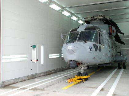 Spray and baking booth for helicopter, excellent exhaust management, correct air balancing, LED lightning, automatic roll up doors